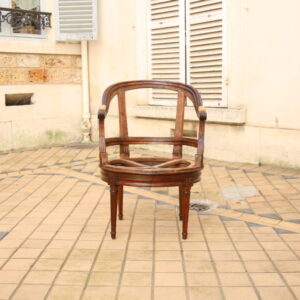 FAUTEUIL DE BUREAU EN HÊTRE TEINTÉ À ASSISE TOURNANTE, D’ÉPOQUE LOUIS XVI